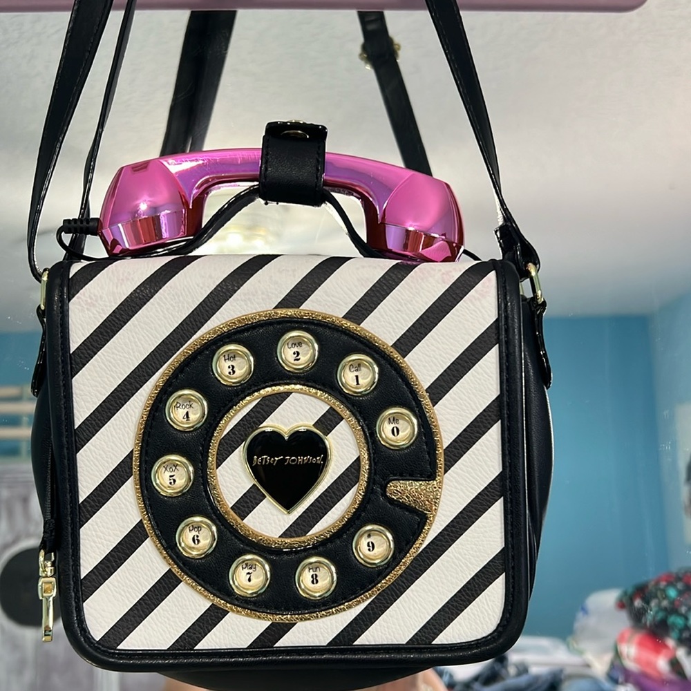 Betsy Johnson Telephone Purse  . It’s ADORABLE!! Has some scratches on phone
